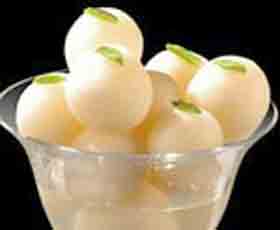 Rasgulla is balls of sweetened cottage cheese in sugar syrup