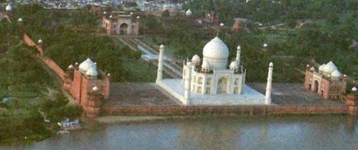 View of the Taj Mahal from behind on the opposite bank of the river Yamuna side